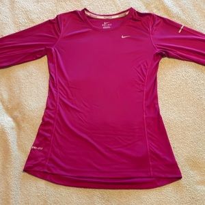 Nike women’s running long sleeve shirt in fuchsia. Size extra small